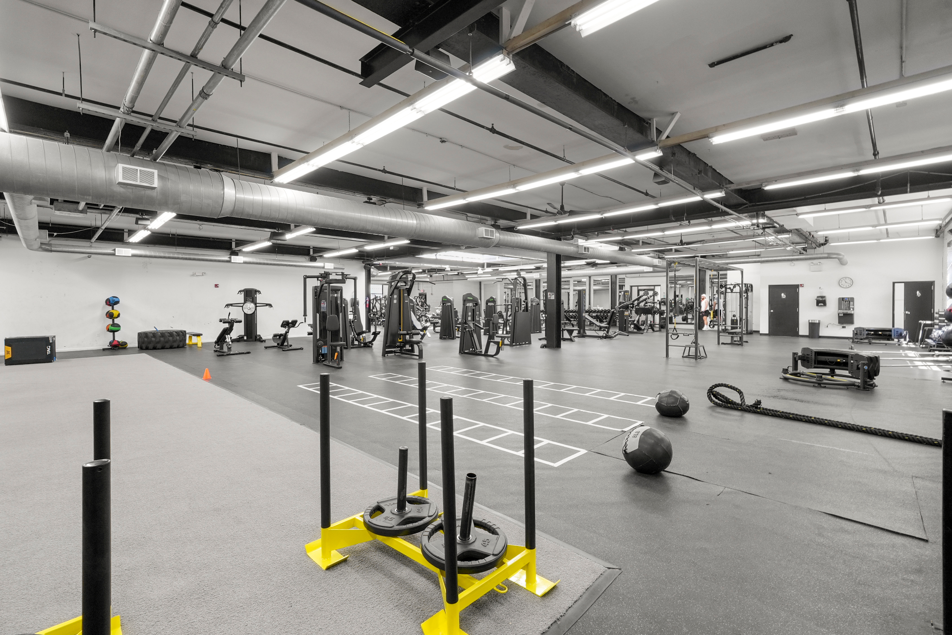 Turf training zone with sleds and functional equipment